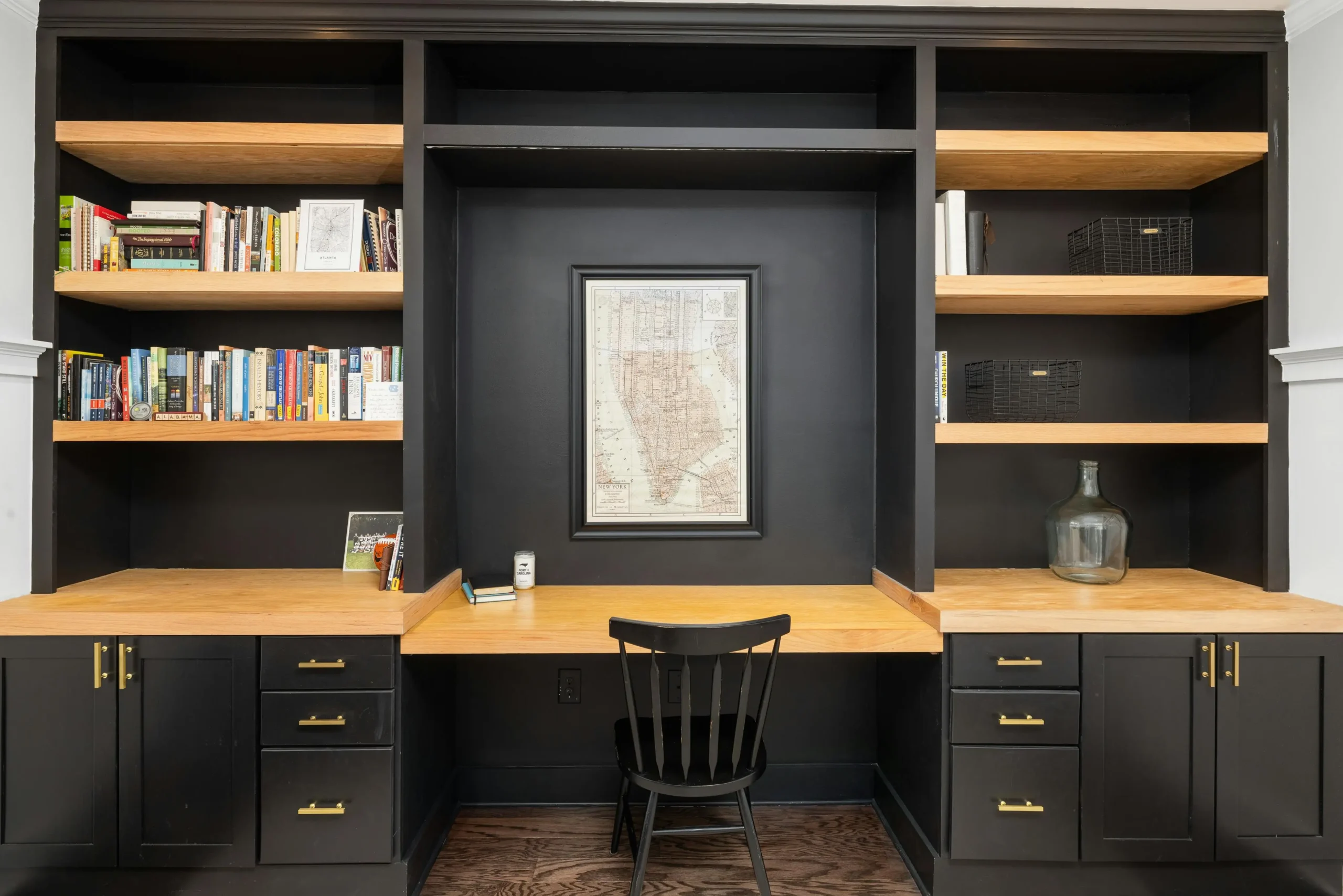 Built-in home office Northern VA with floor-to-ceiling cabinetry, custom desk wall, and warm wood finishes in a McLean home