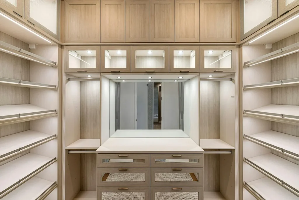 luxury walk-in closet with velvet lined drawers and soft close hardware