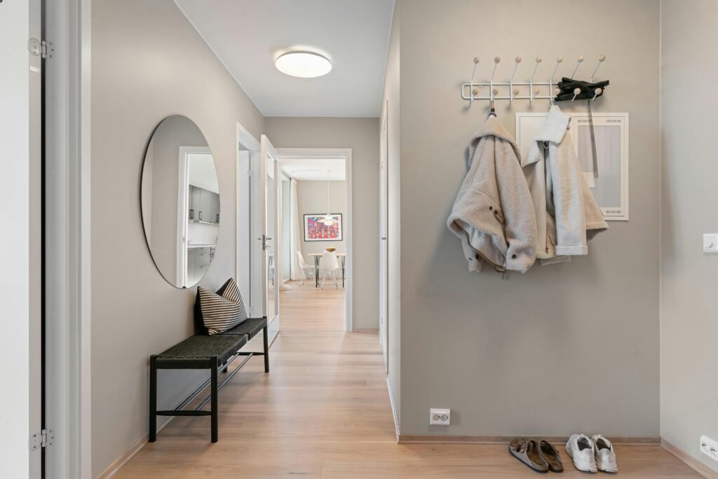 custom mudroom bench with hooks and open cubbies